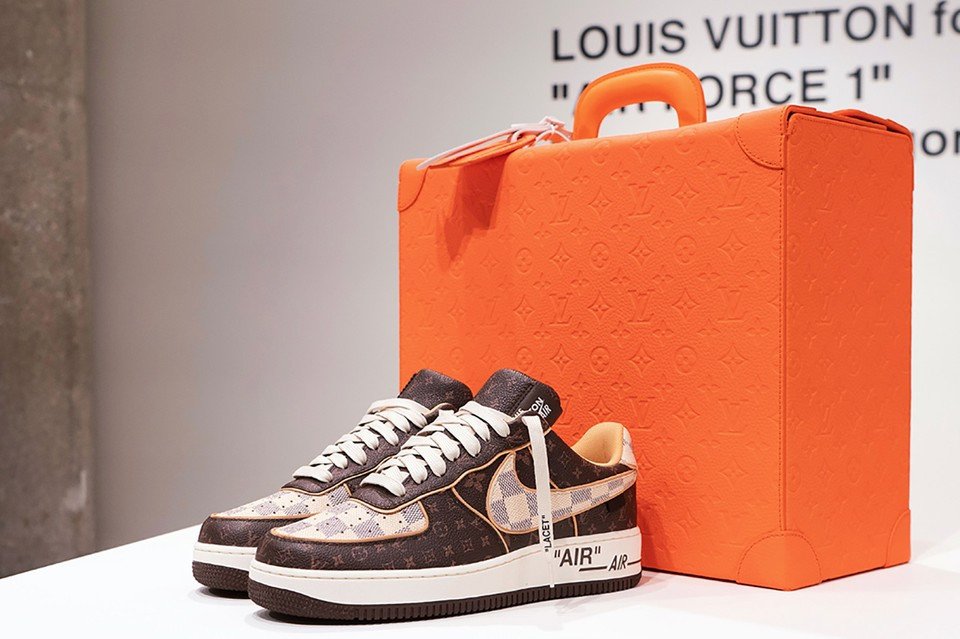 A pair of Louis Vuitton x Nike Air Force 1 sneakers