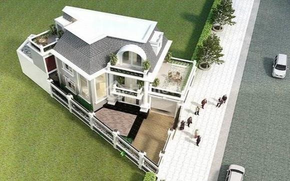 Góc nhìn từ trên cao về một khu dân cư với các ngôi nhà được xây dựng trên mảnh đất thóp hậu tiềm ẩn nhiều thách thức về thiết kế và phong thủy.