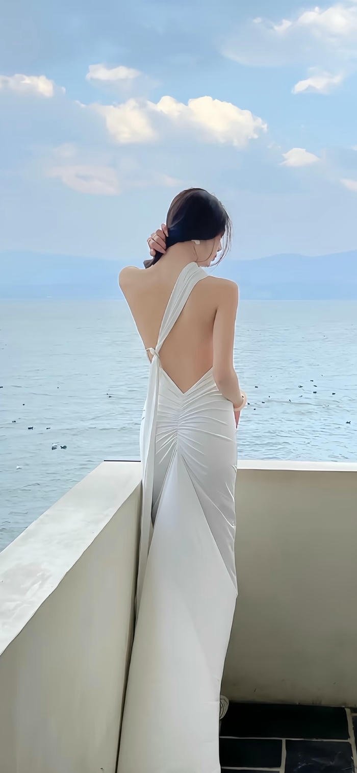 hình nền cô gái quay lưng mặc váy trắng