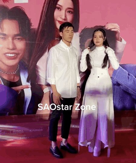 Midu và doanh nhân Trần Duy Minh Đạt tại sự kiện